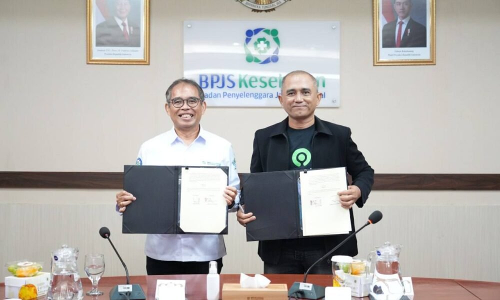 Penandatanganan kerja sama antara BPJS Kesehatan dan PT GoTo Gojek Tokopedia Tbk dalam memperkuat perlindungan jaminan kesehatan bagi pengemudi mitra Gojek melalui Program JKN, Senin (12/1).