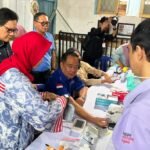 Polda Sumsel Serentak Bagikan Ribuan Masker, Edukasi Kesehatan di Tengah Karhutla